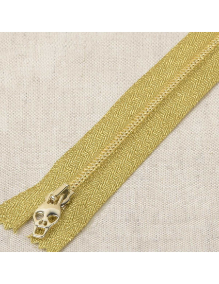 Fecho de metal lurex caveira - Ouro