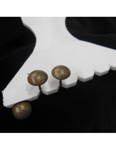Espaçador para pregos de estofador