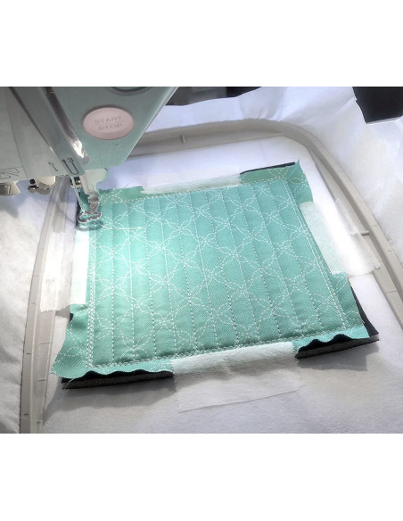 Fita adesiva para bordado à máquina